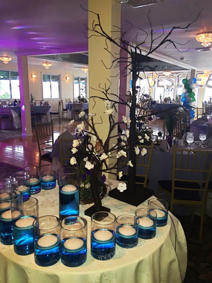 Blue water vases sweet 16 candle ceremony